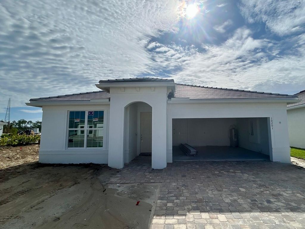Photo of 10201 SW Highpointe Drive, Stuart, FL 34997 (MLS # R11104126)