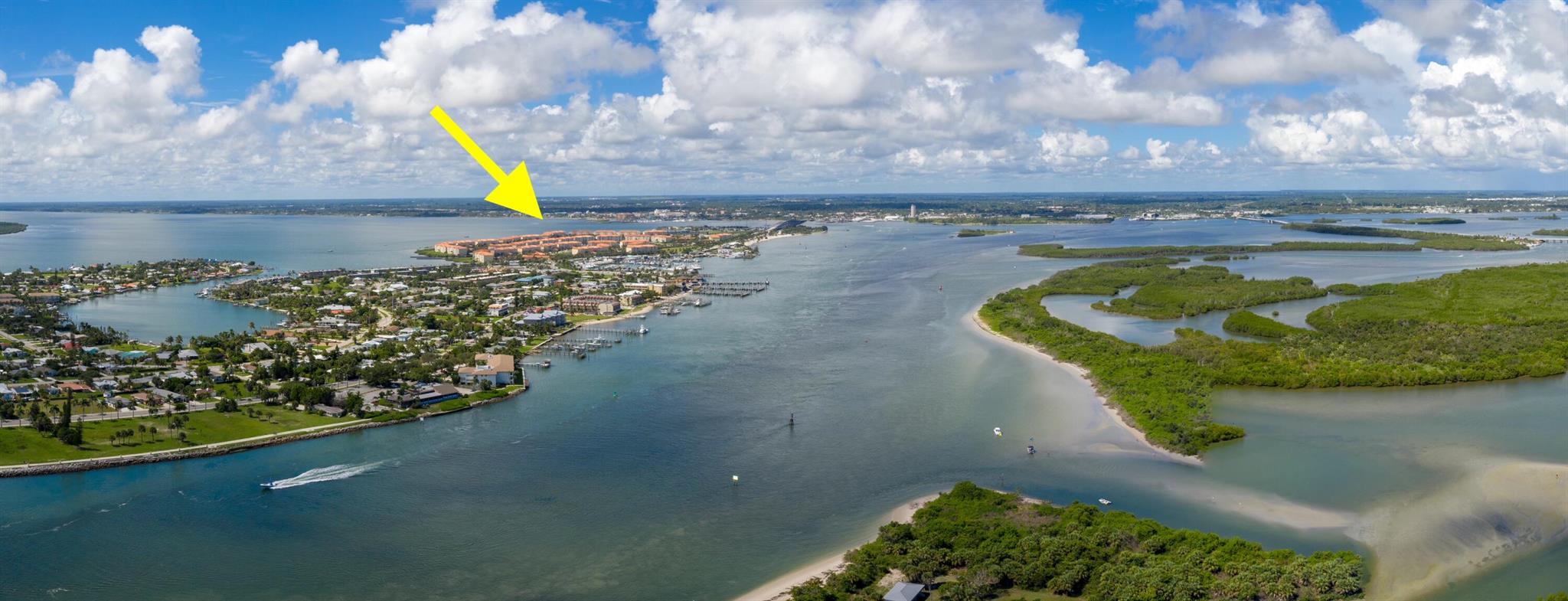 Beautifully renovated first floor condo with peaceful & stunning water views. Excellent location near beaches, restaurants, museums, the theatre, fishing and water sports.Steps away from the clubhouse, pool, exercise center, tennis courts, and bocce ball makes this a a perfect Florida getaway! Spacious 1989 sq ft floor plan with 10 ft ceilings renovated to add recessed LED illumination. No Carpet and Top of the line Italian Floors. Impact windows throughout! 50'' Smart TV. Fully equipped with dishes, silverware, bedding/sheets/towels.2 large bedrooms, 2 full baths and a den as a 3rd bedroom or office.