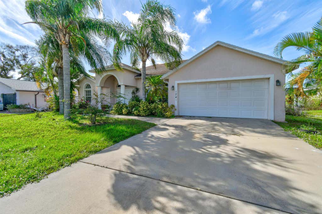 Photo of 1744 SW Castinet Lane, Port Saint Lucie, FL 34953 (MLS # R10994541)