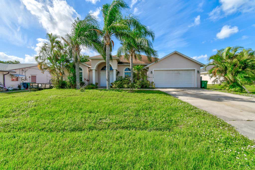 Photo of 1744 SW Castinet Lane, Port Saint Lucie, FL 34953 (MLS # R10994541)