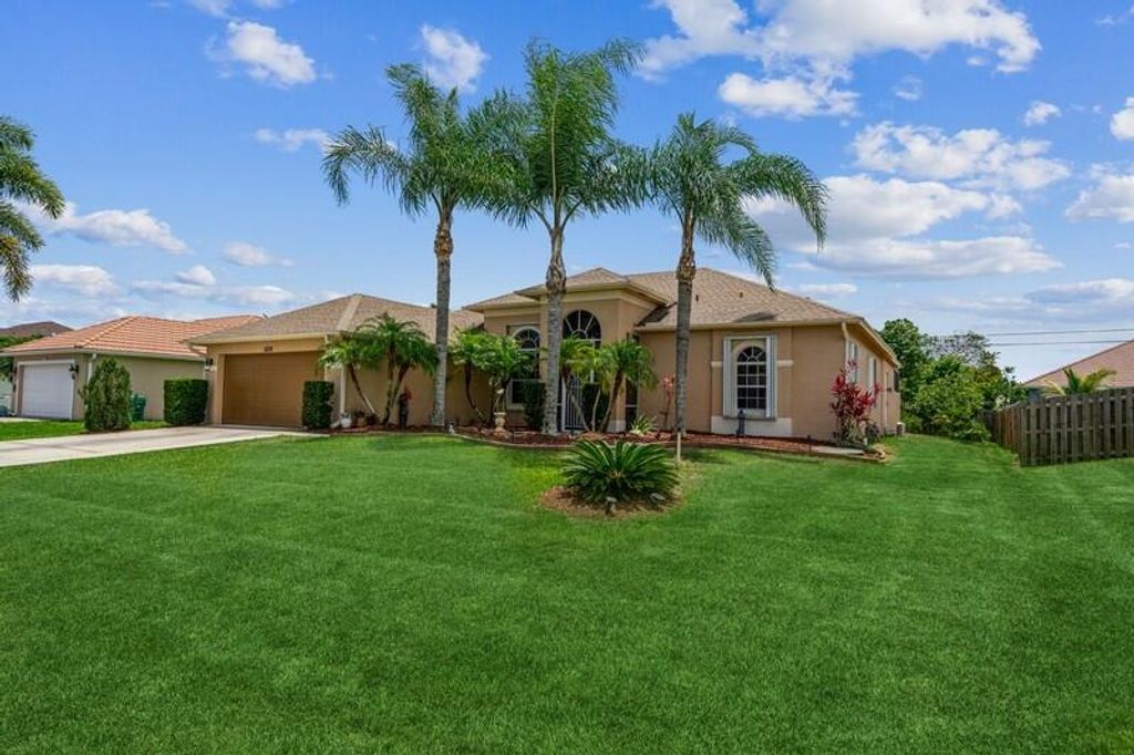 Photo of 1038 SW Fisherman Avenue Ave, Port St Lucie, FL 34953 (MLS # R10804940)