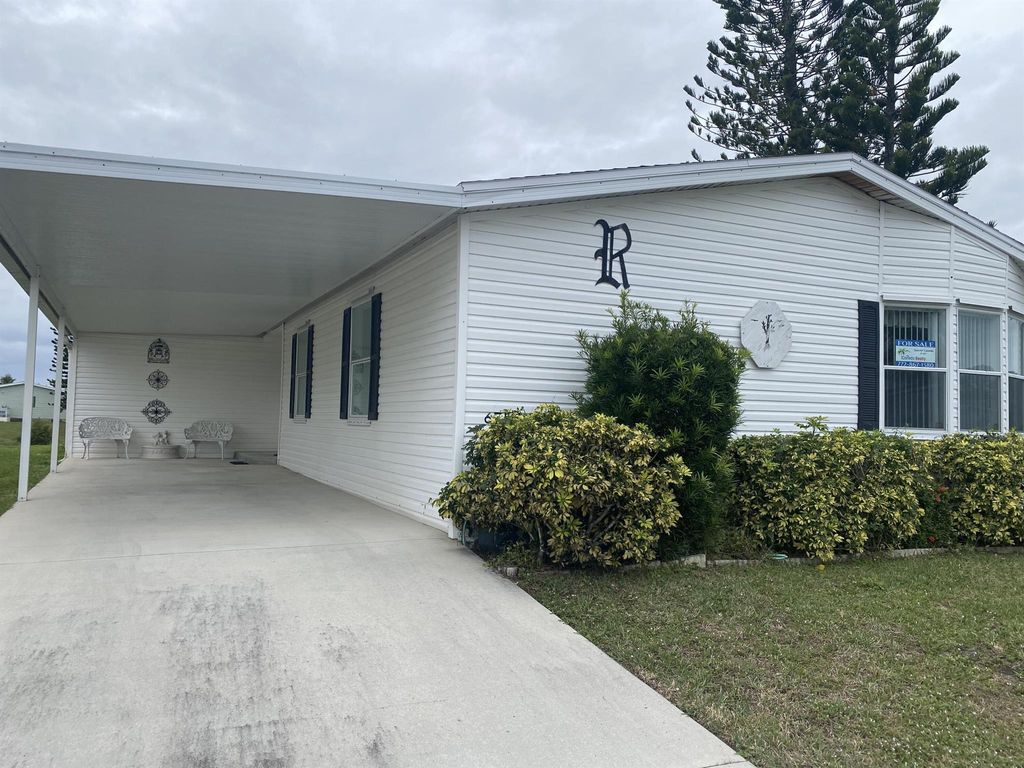 Photo of 6755 Yedra Avenue, Fort Pierce, FL 34951 (MLS # R10945032)