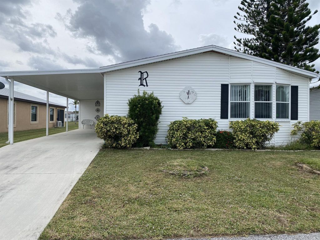 Photo of 6755 Yedra Avenue, Fort Pierce, FL 34951 (MLS # R10945032)