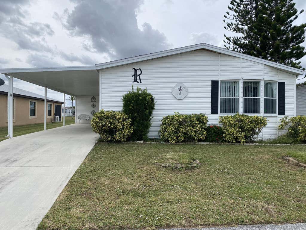 Photo of 6755 Yedra Avenue, Fort Pierce, FL 34951 (MLS # R10945032)