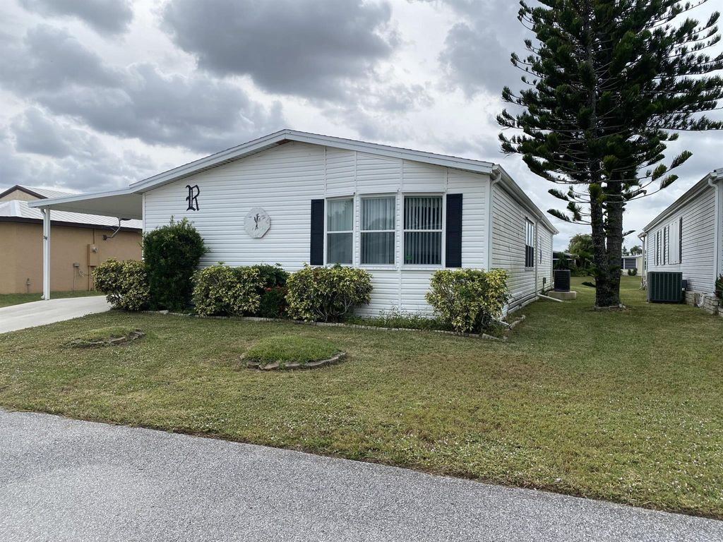 Photo of 6755 Yedra Avenue, Fort Pierce, FL 34951 (MLS # R10945032)
