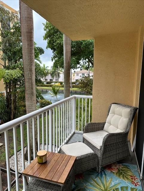 This is it! Sought after complex within 3 miles to Fort Lauderdale International Airport! Bright and sunny 2 bedroom, 2 bathroom unit with over 1000 sq ft with upgrades throughout. Large living and dining areas, white kitchen with granite counters and newer sink, newer garbage disposal and microwave, new central air, and ceramic tile floors throughout. Balcony overlooking canal. Best location close to everything including beaches, the best dive sites, cruise ship port, Hardrock stadium and resort, golf, shopping and restaurants. Vacant and ready to move into! Complex has undergone improvements. Does not get better than this!