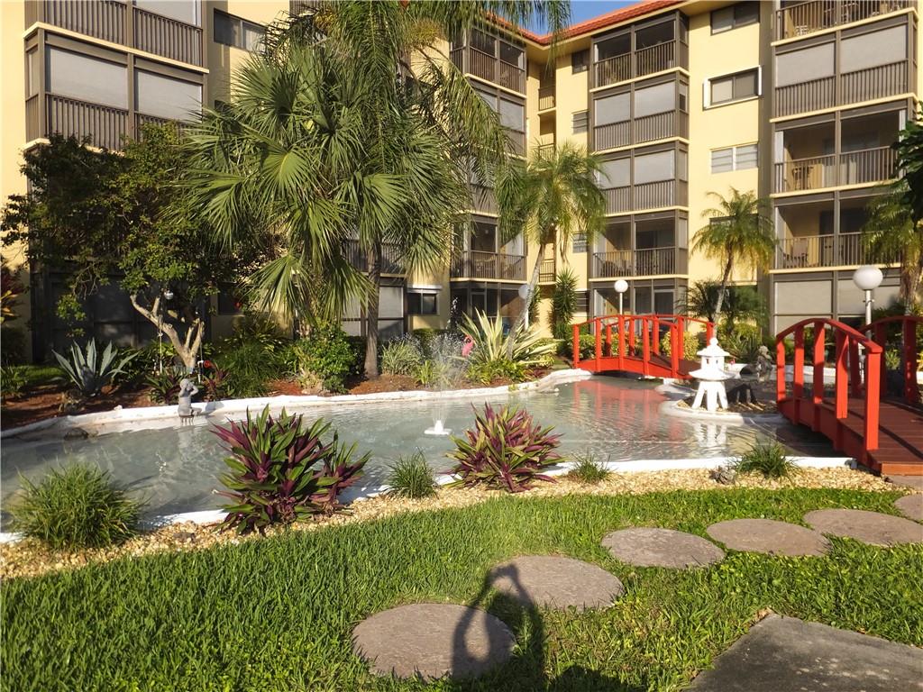 Location, location, location! Beautiful, very nicely remodeled apartment on ground floor with a great view of the lush landscaping and pool area from screened porch. Open plan kitchen with solid high quality wood kitchen cabinets, granite countertops, new stainless steel appliances, remodeled bathrooms, high impact entry doors and windows. Tiled throughout, airy and bright. Beautiful, well maintained and nicely furnished for your convenience, ready to move in! Great place for year round or for seasonal living. Manicured landscaping and pool area. Manager onsite. Walking distance to the beach, close to Greg Norman golf course, close to great restaurants and shopping centers. Easy access to I-95. Per Association this is 55+ community with no rentals allowed.