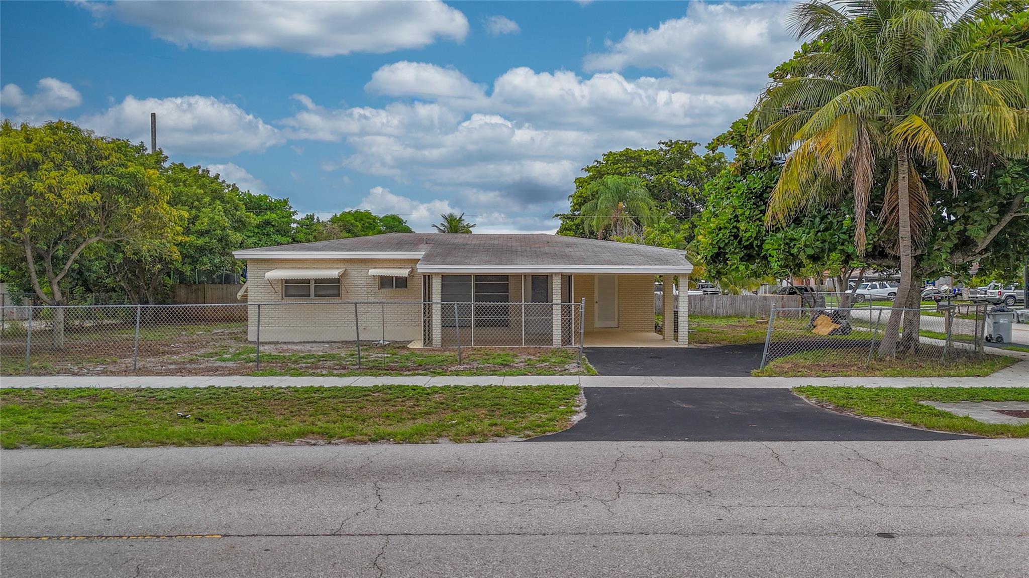Beautiful 2/2 house on a large corner lot with circular driveway, updated bathrooms, kitchen with granite counter
tops and tile floor throughout. Large backyard with room for a BBQ. Close to shopping, schools, and the beaches, and minutes from the highway.