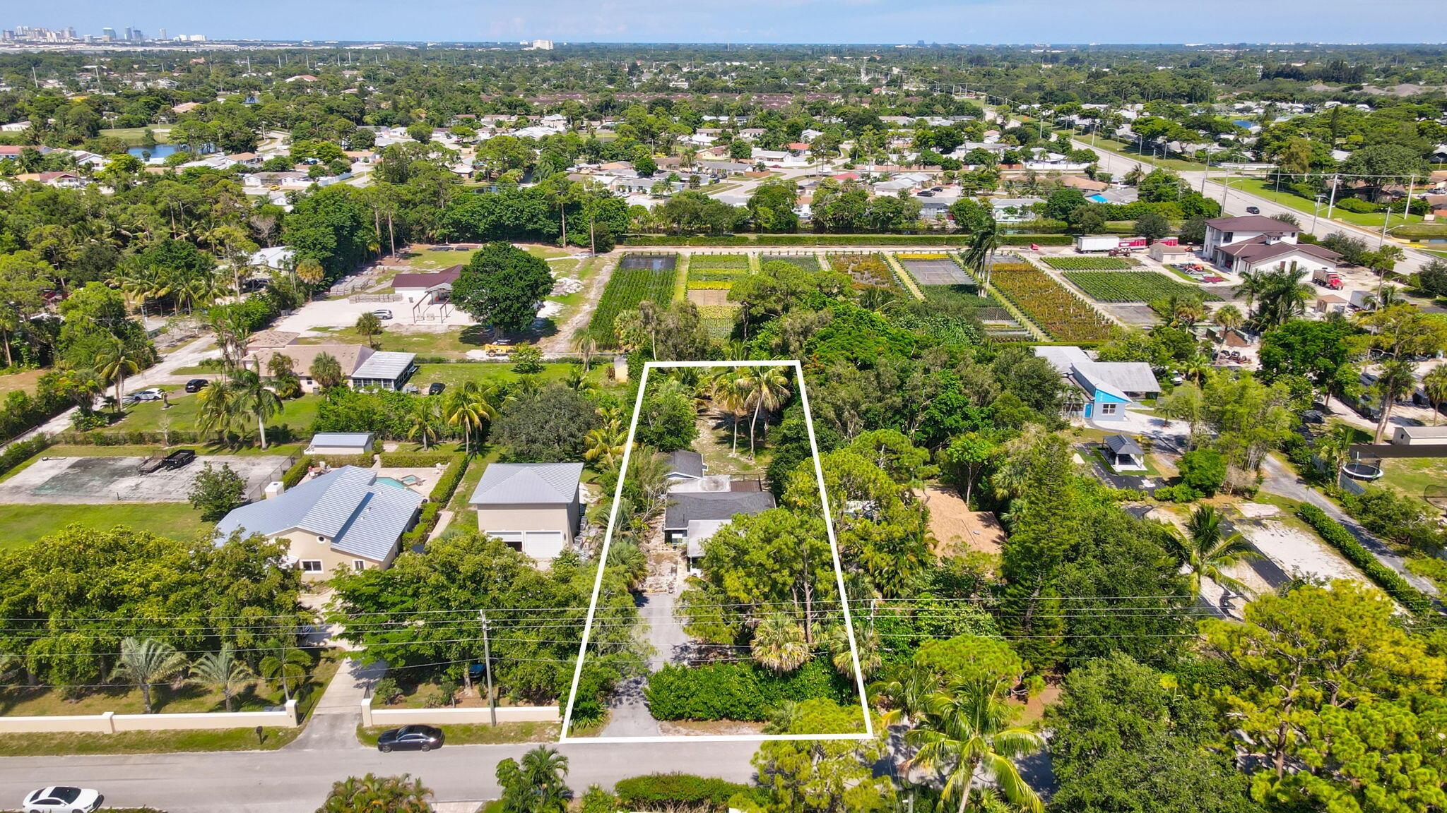 Don't miss this beautifully maintained home featuring a screened-in 2-car carport and numerous recent updates throughout. The kitchen is fully updated with double ovens, perfect for home chefs and entertainers alike. Both bathrooms have been tastefully renovated, offering modern comfort and style.Other highlights include: Roof replaced in 2020Tankless water heater (3 years old) AC system from 2018. Wood plank and laminate flooring throughout - NO carpet! Partially shuttered for hurricane protection. Fully fenced yard - great for pets, kids, or privacy. Plenty of room for a pool and guest house with No HOA! Conveniently located close to shopping, dining, schools, and major roads, this home offers the perfect blend of updates, location, and value. Schedule your showing today!