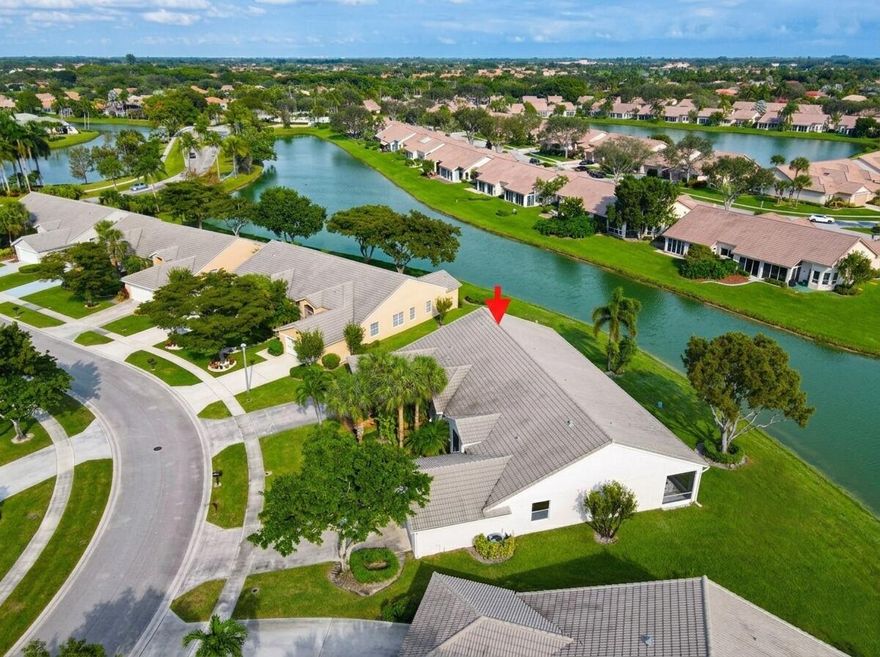 THE LARGEST WATERFRONT FOOTPRINT IN BRITTANY LAKES. Welcome to a residence that redefines villa living within the prestigious Aberdeen Country Club. While standard models in this section offer a traditional layout, this home has been strategically expanded to offer 1,980 SF of under-air living space. By seamlessly integrating the enclosed patio into the home's floor plan, you gain nearly 200 SF of additional climate-controlled comfort--perfect for a sun-drenched morning room or an expansive home office overlooking the water.

Situated on a rare, oversized 6,957 SF pie-shaped lot, this property offers a level of privacy and outdoor ''breathing room'' that is simply unavailable on the standard 5,900 SF lots in the area.

THE ABERDEEN LIFESTYLE: More than just a home, this is an invitatio to an unrivaled social canvas. Enjoy world-class amenities including:

Athletics: High-energy Pickleball, championship Tennis, and pristine Golf.

Wellness: A state-of-the-art fitness center with a full calendar of classes.

Entertainment: A luxury clubhouse featuring Broadway-caliber shows, fine dining, and a vibrant social scene.

UNBEATABLE CONVENIENCE: Located just minutes from the Florida Turnpike, your commute is effortless. You are at the center of everything: Whole Foods, Target, Canyon Town Center, and local favorites like Flakowitz are all right at your fingertips.

This is a rare opportunity to secure the most significant floor plan and lot size in the section. Experience the perfect blend of "lock-and-leave" convenience and the spacious feel of a single-family home.