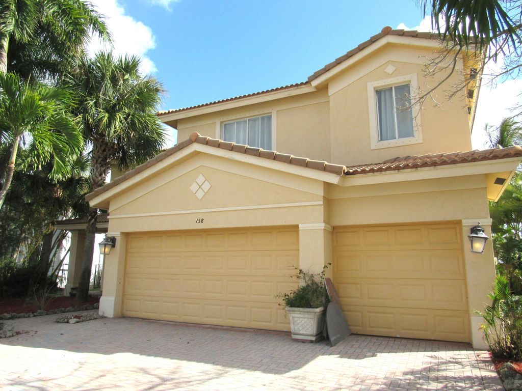 Photo of 158 Bella Vista Way, Royal Palm Beach, FL 33411 (MLS # B26002013)