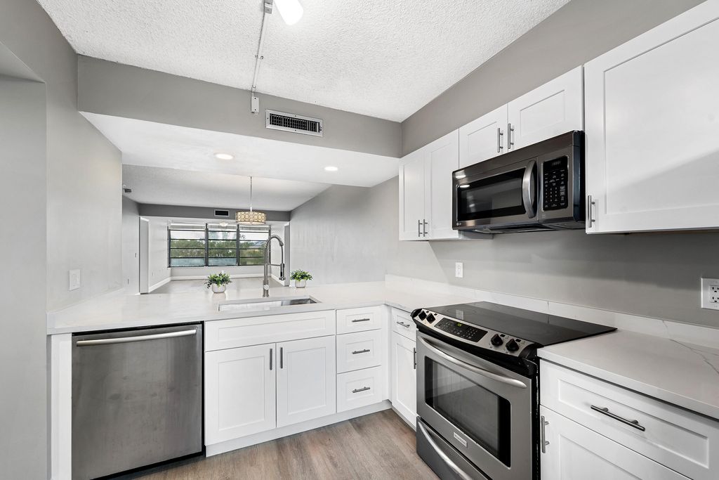 Photo of 3636 Whitehall Drive #402, West Palm Beach, FL 33401 (MLS # B26016343)