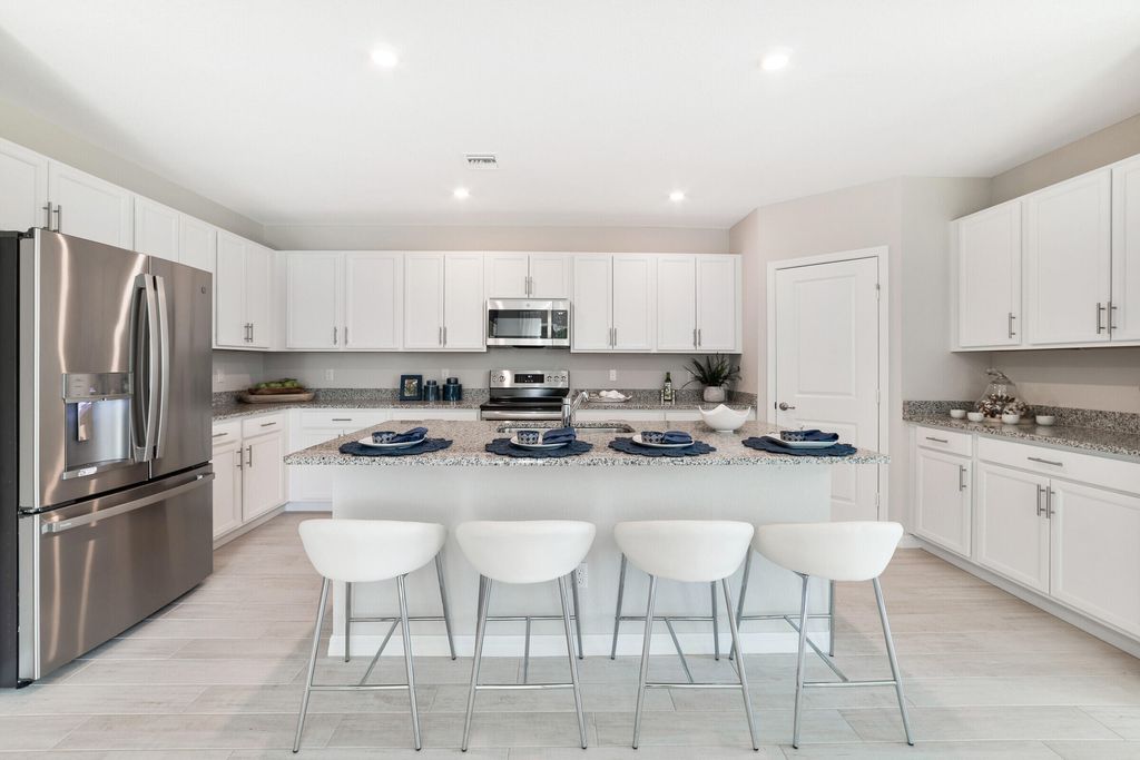 Photo of 4636 SW Lassiter Terrace #253, Port Saint Lucie, FL 34953 (MLS # R10986544)
