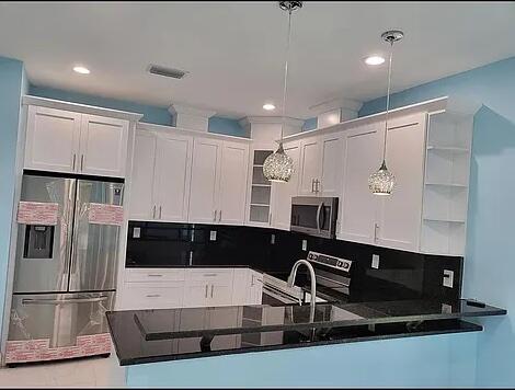 Photo of 409 BROWARD Avenue, Greenacres, FL 33463 (MLS # B26071765)