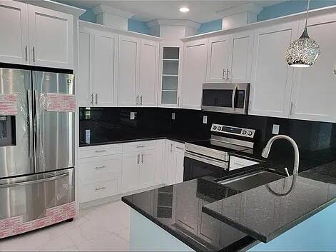Photo of 409 BROWARD Avenue, Greenacres, FL 33463 (MLS # B26071765)