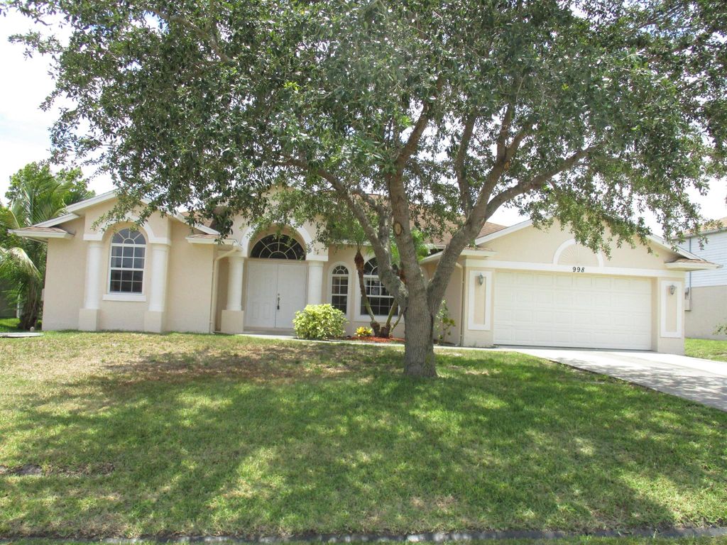 Photo of 998 SW Liberty Avenue, Port St Lucie, FL 34953 (MLS # R10909119)