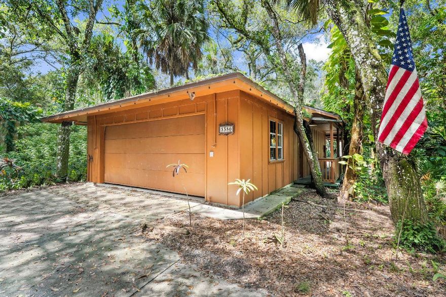 Discover this spectacular property sitting on 4.89 acres! This property offers endless possibilities. 5 bedrooms, 4 baths, state of the art re-mineralized R/O system for the entire home, detached 3 car garage, massive 900sqft workshop, multiple artisan wells, a large screened lanai with a full bathroom, fully fenced acre for horses, 2 large, enclosed animal stalls, walking trails, small pond, several fruit trees and so much more. Don't miss this rare opportunity!