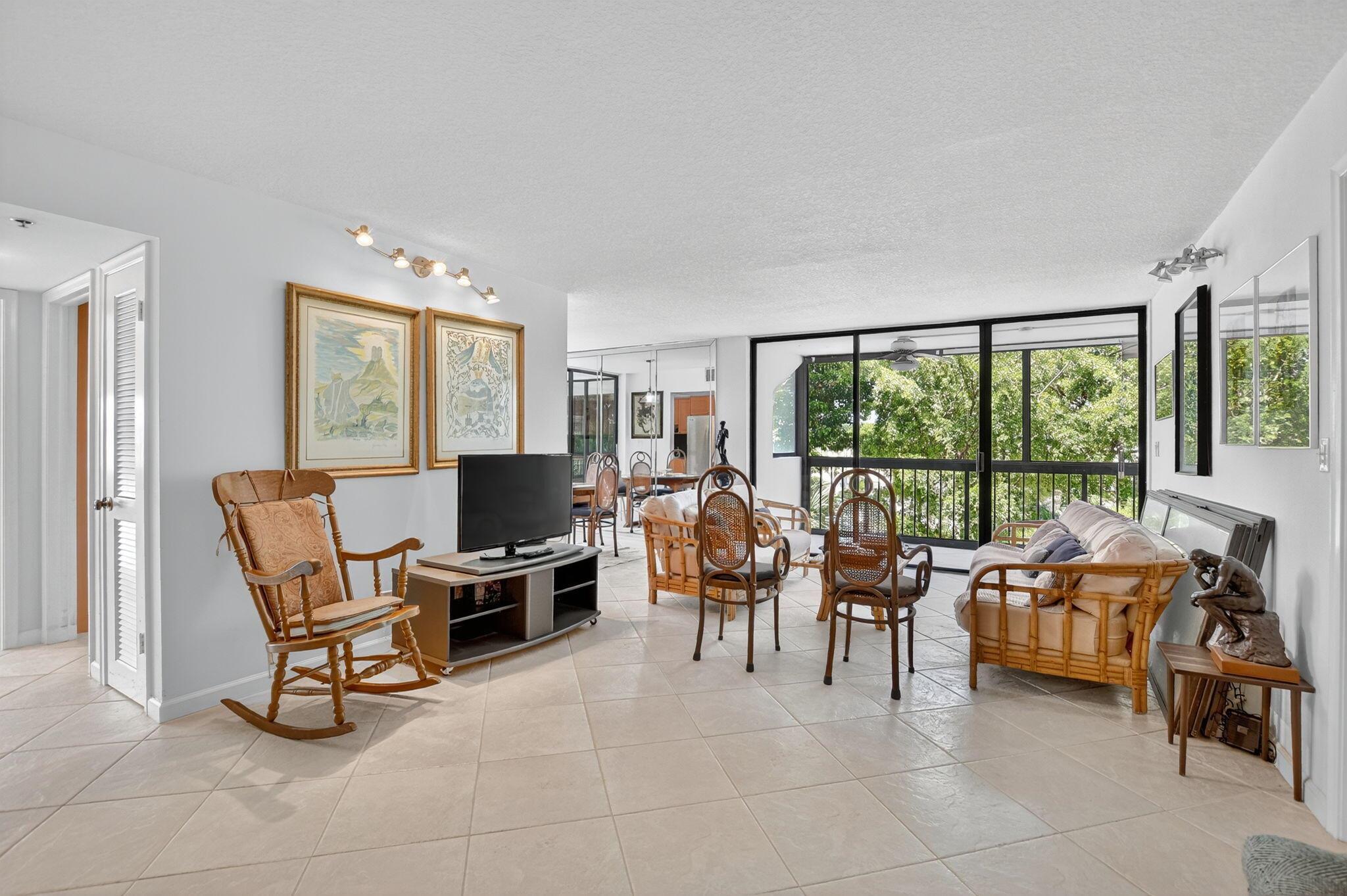 Spacious Bridgewood 2 bed 2 bath corner apartment walking distance to ameneties. Close to Fitness & Aquatics Clubhouse. ~ Imagine life inside the Nation's #1 Private Residential Country Club Lifestyle offering resort-style living. Conveniently located less than 10 minutes from downtown Boca Raton. PLAY our 4 Golf courses, 27 Tennis courts and 14 Pickleball courts; SHOP our retail store, golf and tennis pro shops, DINE in our 8 dining venues. Spend the day RELAXING at our 5-star fitness center, pool, spa and salon. ENJOY endless activities in over 450,000 sq. ft. of exceptional amenities & stellar service. Mandatory Joining Fee: $150,000, BWMA Capital Contribution: $10,000, Annual Social Dues: $22,593.