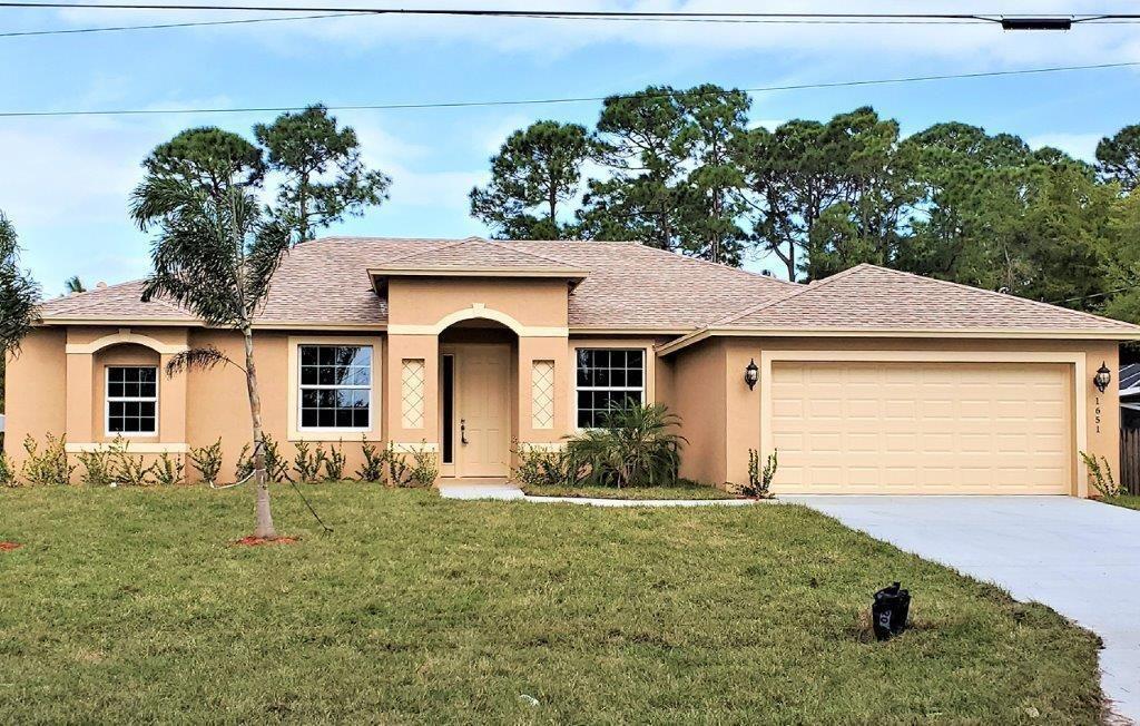 Photo of 1758 SW Millikin Avenue, Port Saint Lucie, FL 34953 (MLS # R10705936)