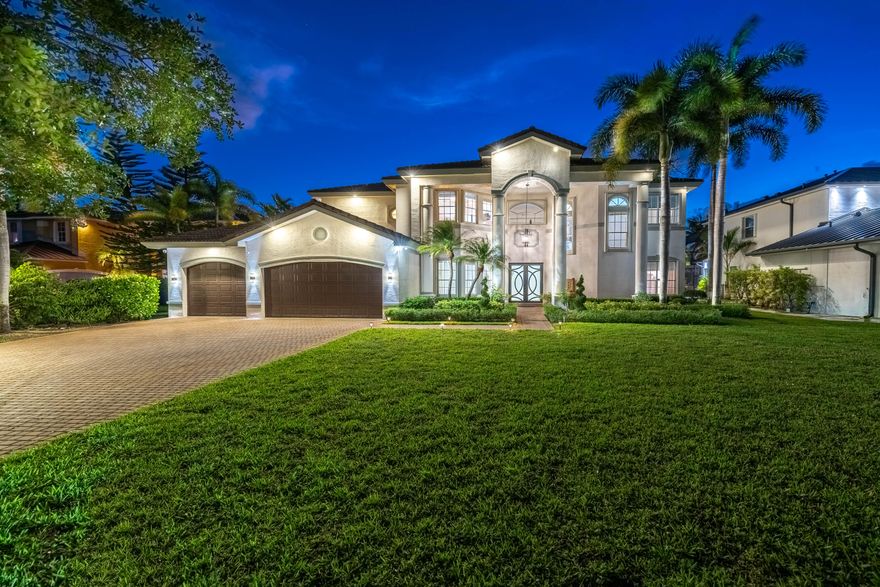 Stunning lakefront residence with pool on an oversized 19,762 SF lot, offering space, privacy, and beautiful water views. Elegant interior featuring marble floors throughout and a desirable floor plan with 2 bedrooms on the first floor. Completely updated gourmet kitchen and designer bathrooms, enhanced by new modern lighting. Enjoy outdoor living with a private pool overlooking the lake, perfect for entertaining. Additional features include accordion shutters, new electric water heater, new generator, and A/C 2004. A rare opportunity combining luxury, comfort, and an exceptional lot size.