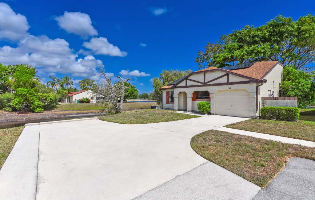 Photo of 2210 SE Brekenridge Circle, Port Saint Lucie, FL 34952 (MLS # R11030161)