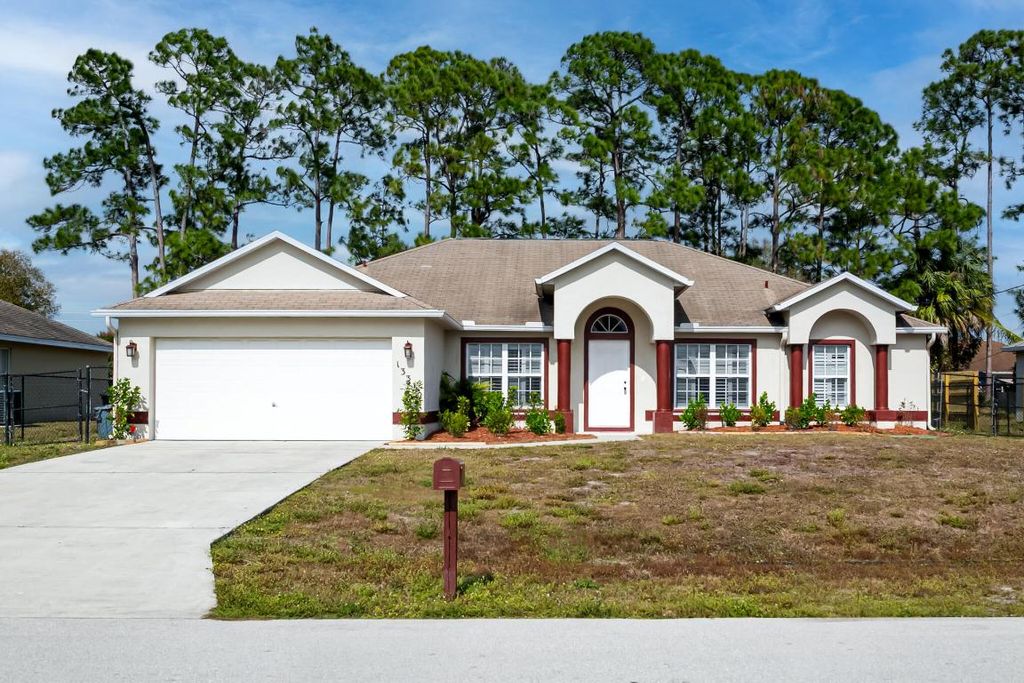 Photo of 1331 SW Ingrassina Avenue, Port Saint Lucie, FL 34953 (MLS # R11120014)