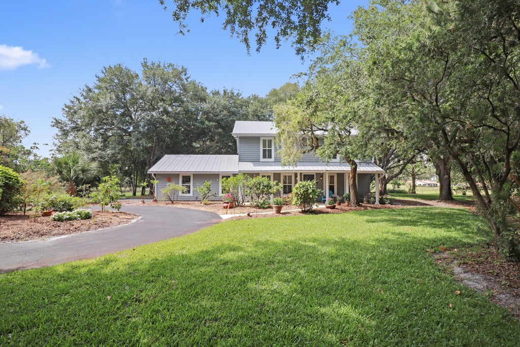 Photo of 2414 SW Love Court, Palm City, FL 34990 (MLS # R11090398)