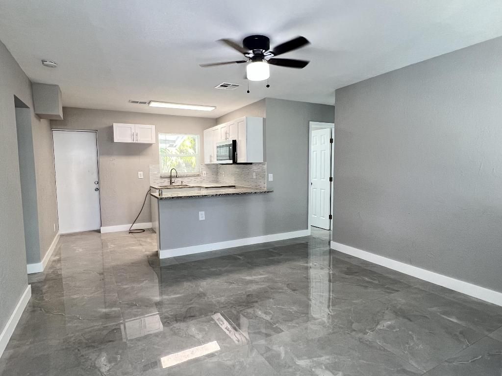 Photo of 3380 E Atlantic Drive, Boynton Beach, FL 33435 (MLS # R11155010)