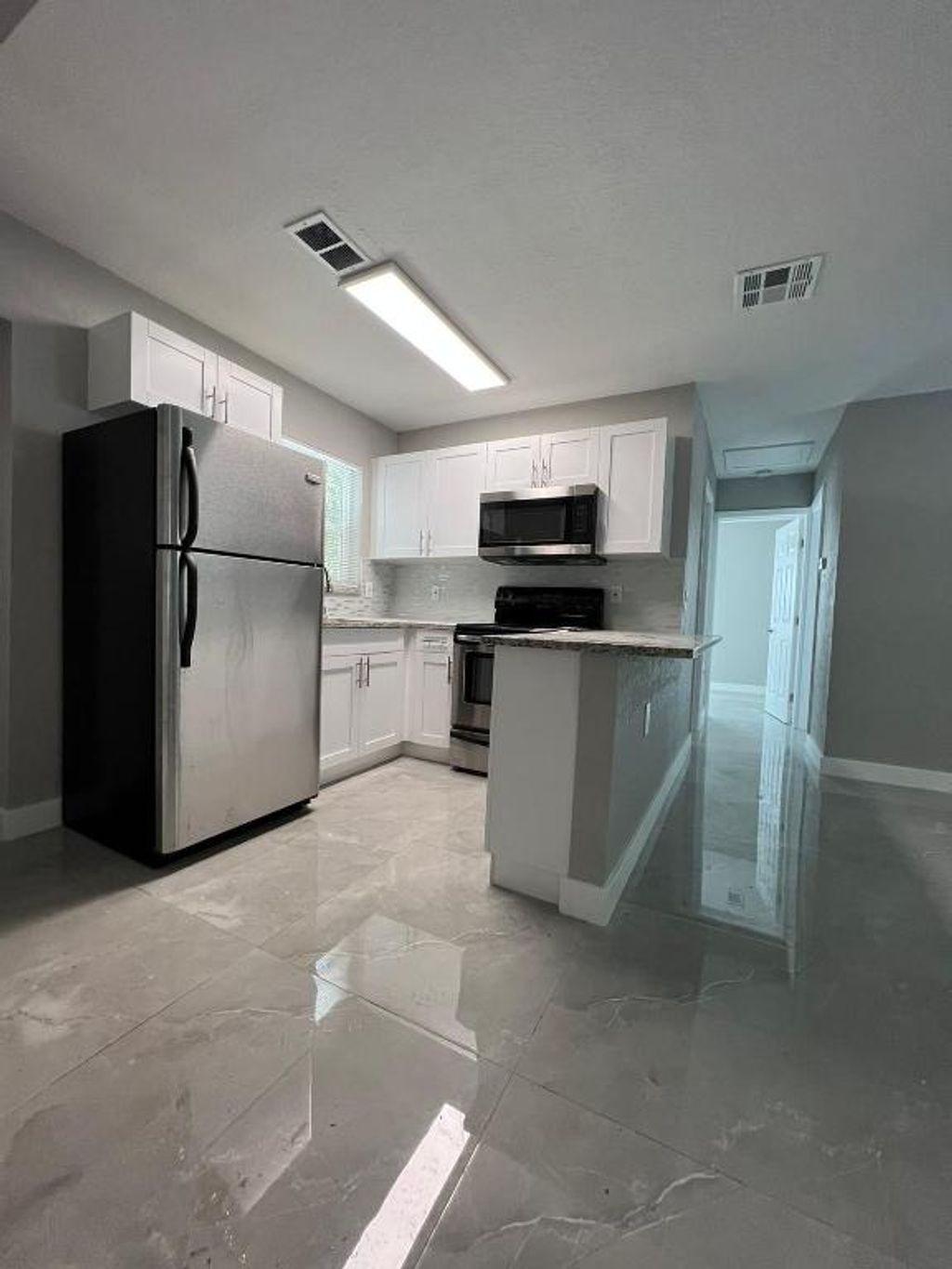 Photo of 3380 E Atlantic Drive, Boynton Beach, FL 33435 (MLS # R11155010)