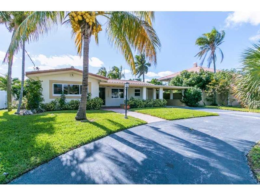 Enjoy the best of waterfront and beachside living! This home offers deep water dockage and private beach club! Walk across the street to your private beach. Quaint Island community. Gorgeous pool and spa, updated kitchen with granite counters.