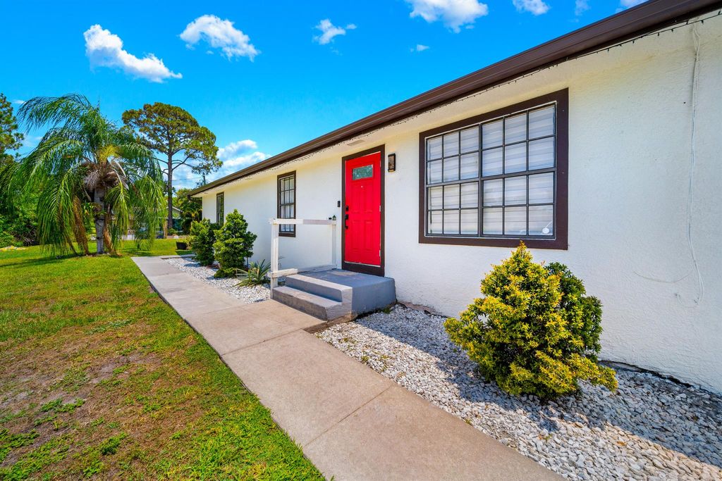 Photo of 12228 61st Lane N, West Palm Beach, FL 33412 (MLS # R11000442)