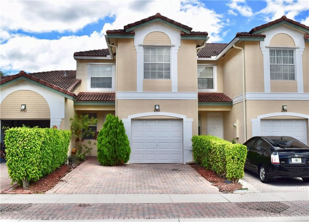Photo of 4768 NW 116th Ter Ter, Coral Springs, FL 33076 (MLS # F10334487)