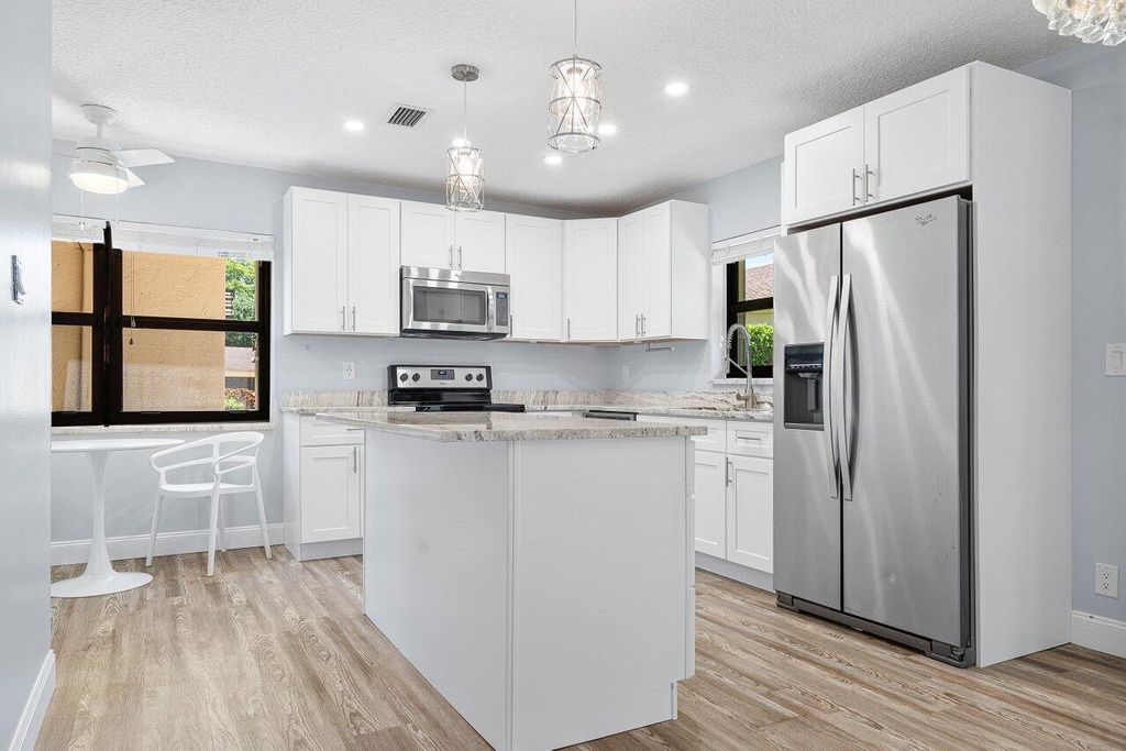 Photo of 796 NW 25th Avenue, Delray Beach, FL 33445 (MLS # R11021573)