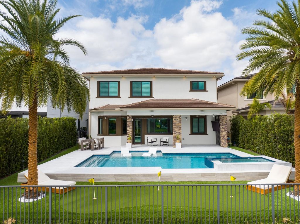 Photo of 10822 Oceano Way, Parkland, FL 33076 (MLS # B26002261)