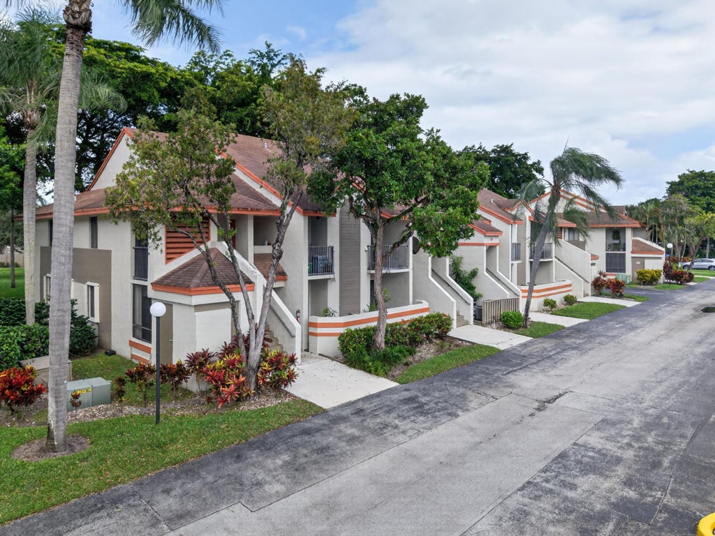 Photo of 5599 Courtyard Drive, Margate, FL 33063 (MLS # B26093409)