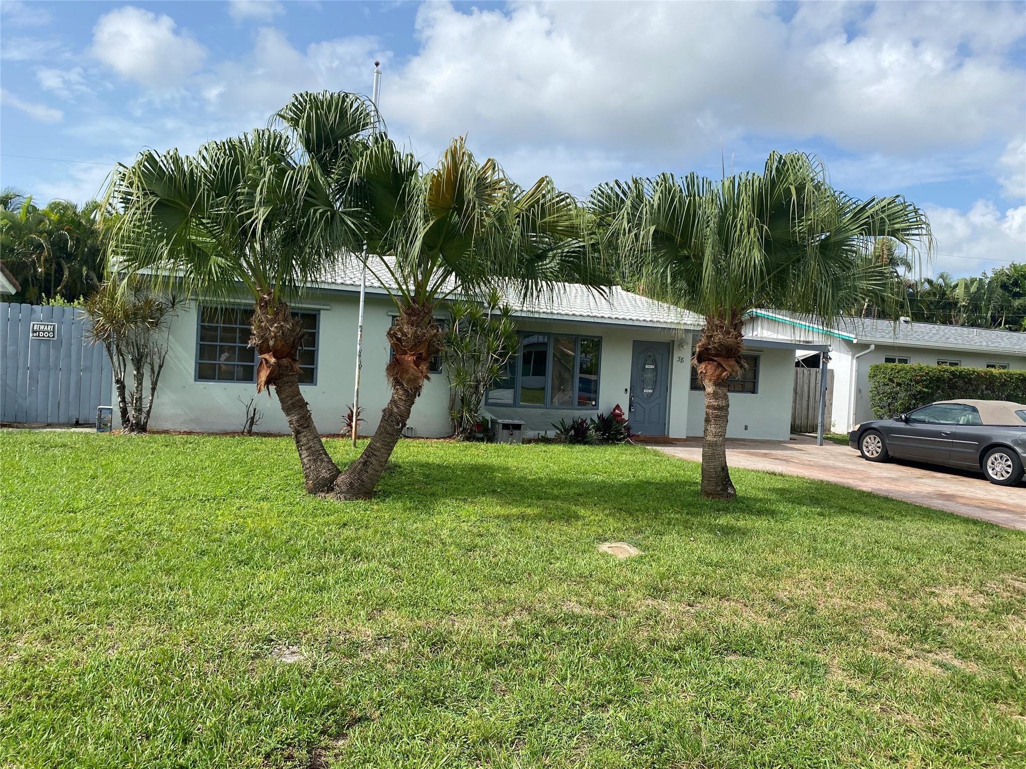 Investor Opportunity! Spacious 3BR/3BA home with fenced yard and pool. Working range/oven, refrigerator, washer, dryer. Functional (but aged) central AC. Newly repaired plumbing and sewer line and electrical panel. Roof needs significant repair or replacement. Tile flooring throughout. Located just minutes from Wilton Drive, downtown Fort Lauderdale, I-95, and the beach, this home offers the best of South Florida living in a prime location. Quiet, well-kept neighborhood, with rental potential up to $4,400/mo. This property has enormous potential at a discount price- Don't miss out!!
