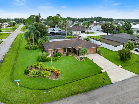 Photo of 297 SW Grove Avenue, Port Saint Lucie, FL 34983 (MLS # B26079847)