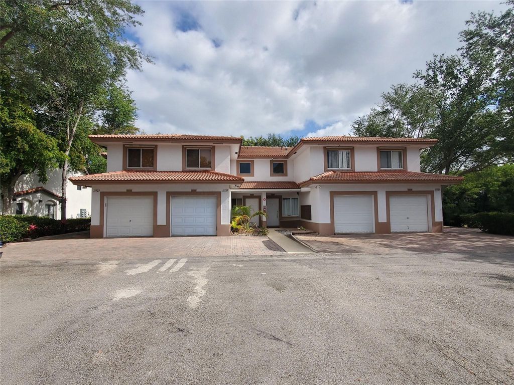 Photo of 11527 Royal Palm Boulevard, Coral Springs, FL 33065 (MLS # F10507270)