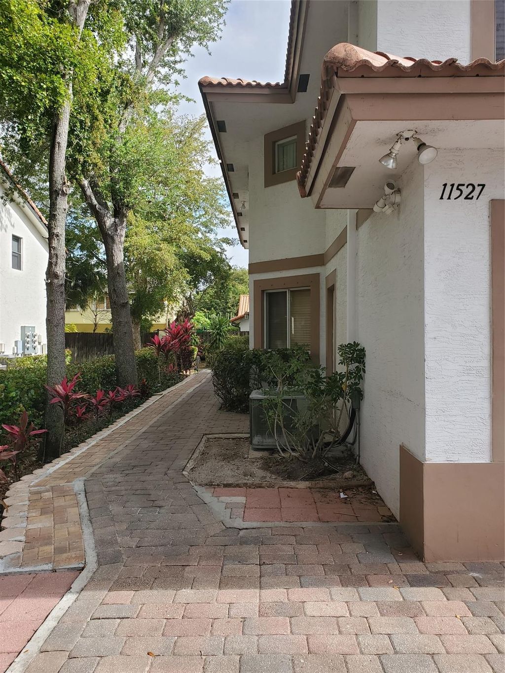 Photo of 11527 Royal Palm Boulevard, Coral Springs, FL 33065 (MLS # F10507270)