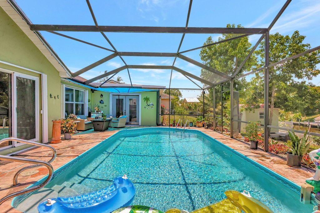 Photo of 197 NE Sagamore Terrace, Port Saint Lucie, FL 34953 (MLS # R11026597)