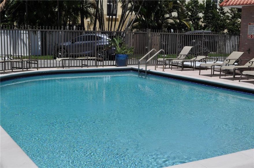 Updated 1BR/1BA condo at La Cancha in Victoria Park! Spacious and open floor plan with slate-like smooth tile throughout, crown molding and plantation shutters. Modern kitchen with pendant & accent lighting, euro-style cabinetry, granite counter tops and stainless appliances. Bedroom suite features a wall of French doors separating the living area, giving the apartment an even larger feel, and a spa-like bathroom (accessible from both living area and bedroom) which includes a shower with seamless glass enclosure, pebble floor, rain & hand held shower heads and modern vanity sink. Walk-in closet has been meticulously outfitted to maximize storage. Impact windows keep your sanctuary safe, quiet & cool. Very well run complex ideally located adjacent to Holiday Park & minutes to Las Olas!