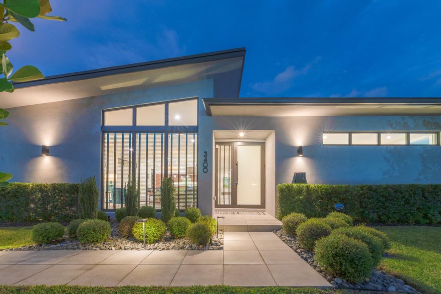 Every room opens to the courtyard pool — a private resort in Oakland Park’s Culinary Arts District. Built in 2022 by Zahn Development on two lots, this mid-century inspired 3,300± SF home blends dramatic scale, clean lines, and seamless indoor-outdoor flow. The 3BR/3.5BA plan features a sleek entertainer’s kitchen, spa-style primary suite, guest wing, and double garage. Privacy defines the home, from its walled courtyard retreat to its rare double-lot footprint. Walkable to Oakland Park dining, breweries, and arts, steps to Wilton Manors, and minutes to Fort Lauderdale beaches, Las Olas, and the airport. Rare chance to own a design-led residence in 33334 with luxury, architecture, lifestyle — ideal for buyers searching Oakland Park, Wilton Manors, or Fort Lauderdale. modern homes online.