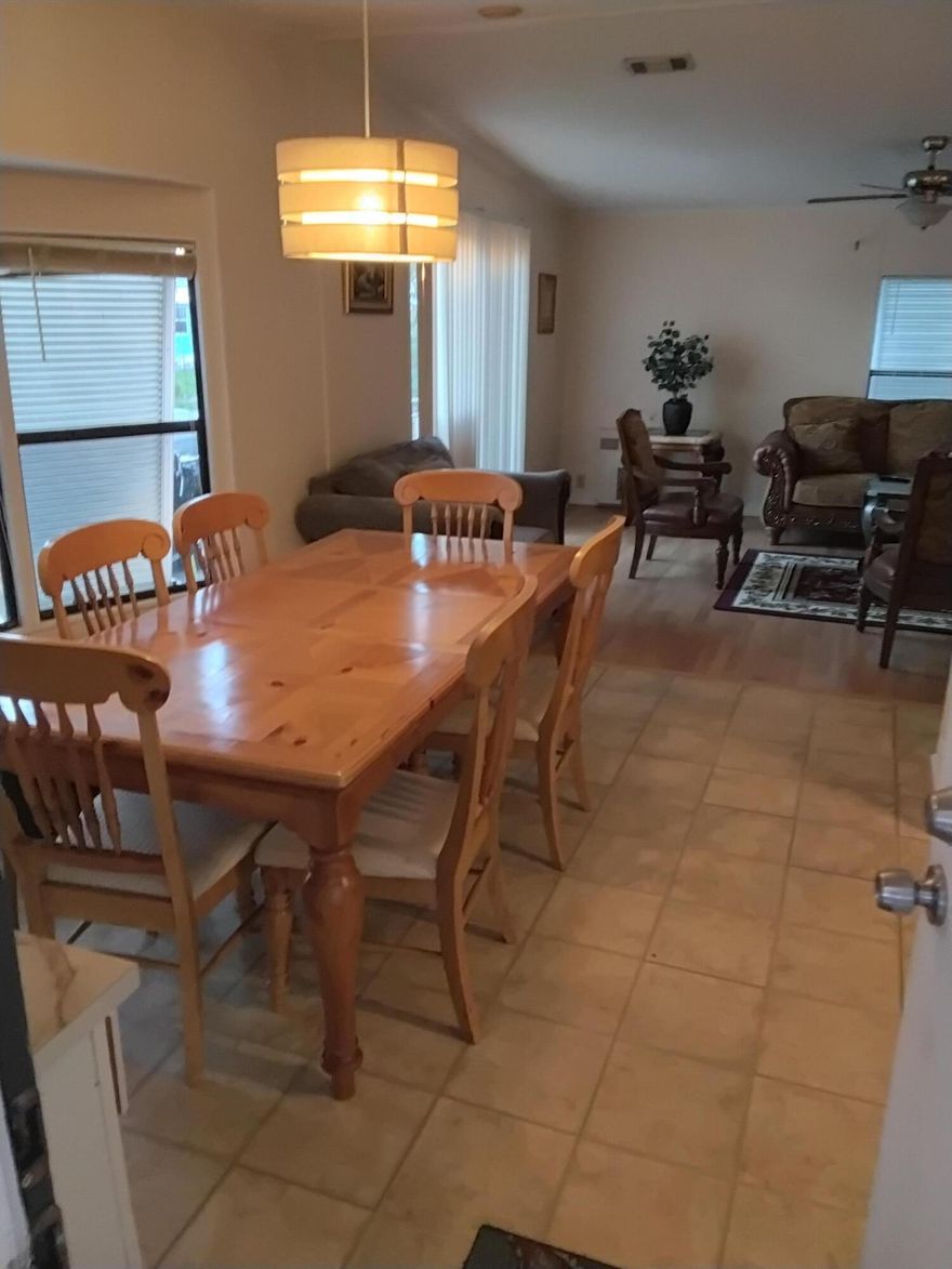 Welcome to 14 Jacaranda Lane, a fully furnished mobile home located in the highly desirable 55+ Spanish Lakes community in Port St. Lucie. This charming residence is being sold with all furnishings included, perfect for seasonal living, downsizing, or a low‑maintenance Florida retreat.  The home has been well cared for and offers a warm, comfortable layout ready for its next owner.   Spanish Lakes is known for its active lifestyle, friendly atmosphere, and convenient access to shopping, dining, medical facilities, and beautiful local beaches. Residents enjoy a variety of community amenities and a welcoming environment designed for relaxed, enjoyable living.  This is a great opportunity to secure a furnished home in one of Port St. Lucie's most popular 55+ communities Very motivated seller. Will consider all offers