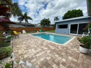 Photo of 6601 LAKE CLARKE Drive, Lake Clarke Shores, FL 33406 (MLS # B26079307)