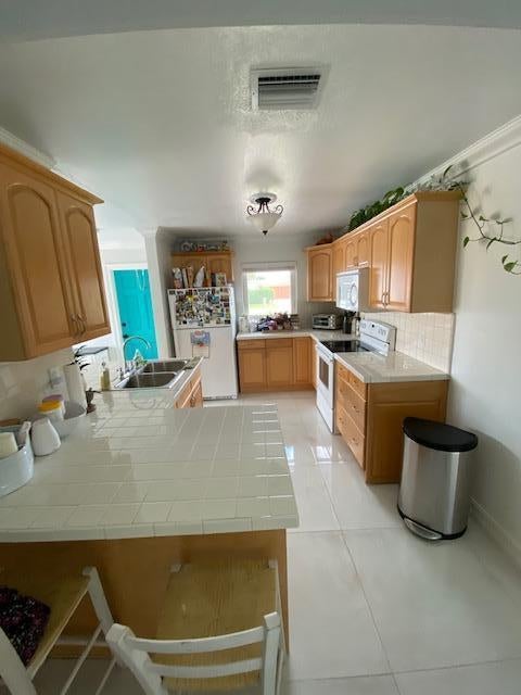 Tiny photo for 6601 LAKE CLARKE Drive, Lake Clarke Shores, FL 33406 (MLS # B26079307)