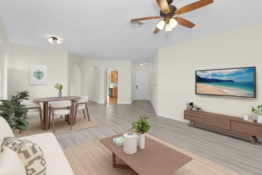 CBS 2-BR + Den home in Tradition! Featuring HURRICANE IMPACT WINDOWS & SLIDING GLASS DOORS offering a GREAT Opportunity to Customize & ADD Value. Southern Model! Kitchen slider leads directly out into your spacious, private porch, perfect for entertaining & outdoor living. While the home needs some updating, the layout and existing features provide a strong foundation to create your perfect living space, making it IDEAL for the buyer looking to renovate to YOUR taste! Strong bones with desirable features already in place.  Fully Fenced yard, Laminated Floors in main living area! Plenty of potential.  AC, WH & appliances 2018. HOA includes Lawn, Cable, High-speed Internet & Pest Control. Steps away from the Resort Style Pool, Jacuzzi, Club House & Gym.  Super Easy to Show! SCHEDULE TODAY!