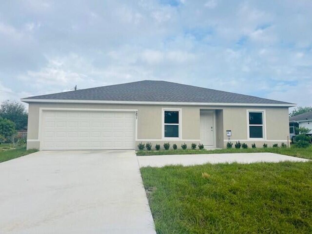 Photo of 261 NW Bayshore Boulevard, Port St Lucie, FL 34983 (MLS # R10841956)