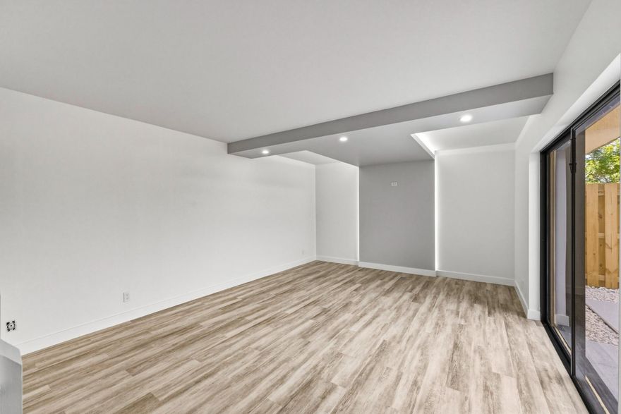 Beautifully remodeled 2 bedroom, 2 bath, two-story townhome featuring modern upgrades throughout. Enjoy laminate flooring, a stylish kitchen with white shaker cabinets, quartz countertops, and stainless steel appliances. The home offers an impact front door and accordion shutters for added protection. Both spacious bedrooms upstairs include private balconies, perfect for relaxing. Step outside to your charming courtyard patio for additional outdoor living. Ideally located near shopping, dining, and major highways for ultimate convenience.