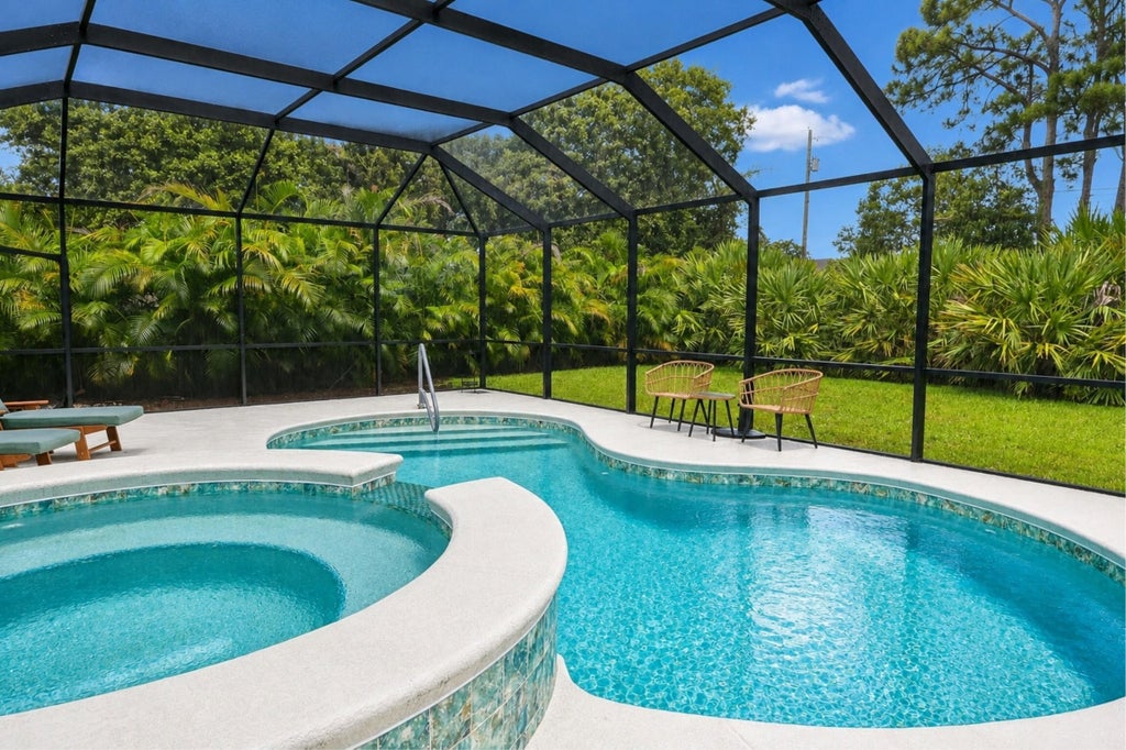 Photo of 415 SE Calmoso Drive, Port Saint Lucie, FL 34983 (MLS # B26069900)
