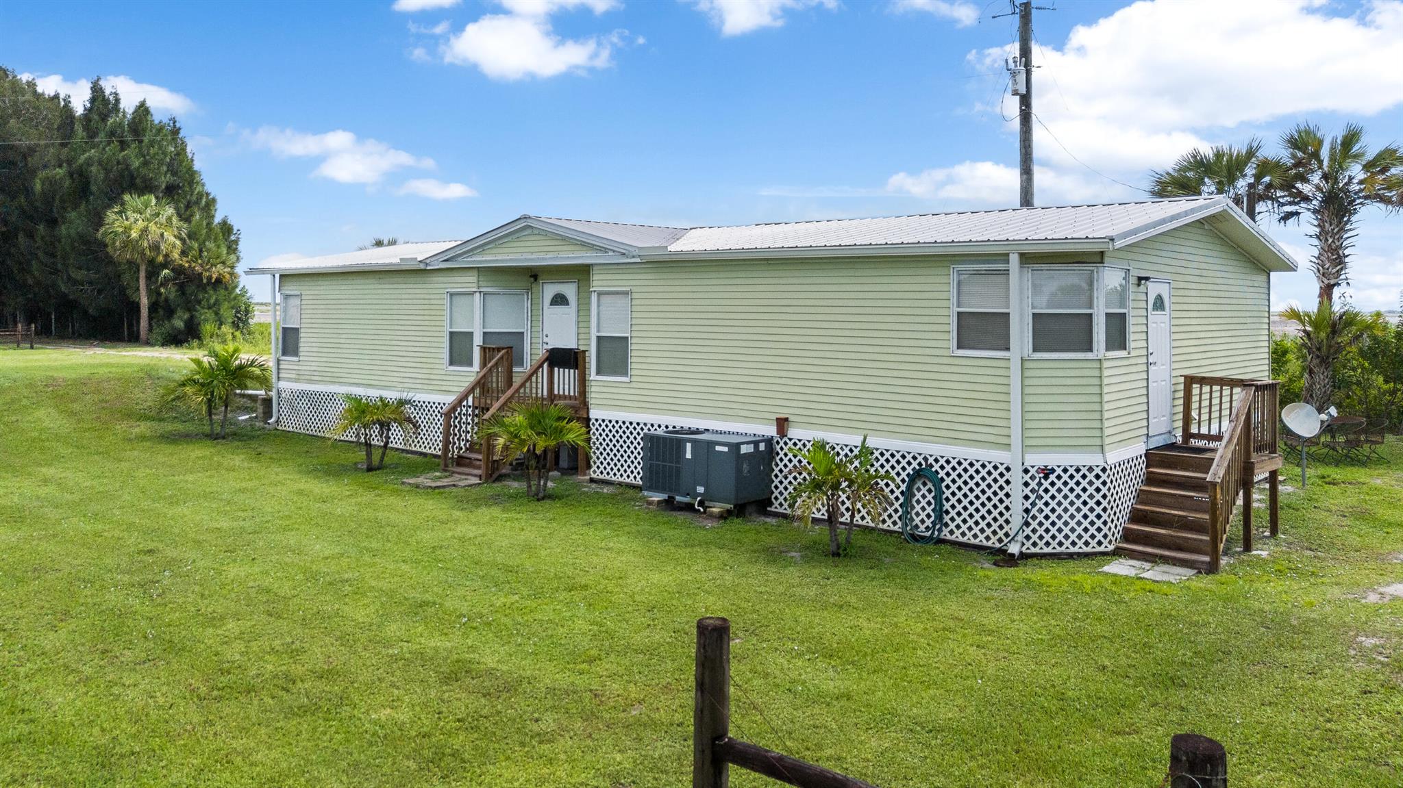 Cozy 3-Bed, 2-Bath Double-Wide Mobile Home on over 1+ AcreNestled in a serene, quiet community surrounded by farmland, this fully furnished mobile home offers the perfect blend of comfort and investment potential. Currently used for Airbnb and short-term rentals, it's a money-making property with proven income. The home features spacious rooms and a peaceful atmosphere, ideal for guests seeking a quiet retreat. The owner is offering this property together with an adjacent home as a bundle. Don't miss out--call today for more details and to schedule a viewing!